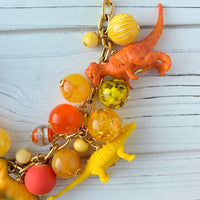 Sunny Yellow and Tangerine Orange Dinosaur Necklace