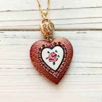 Red heart locket necklace for women. Locket pendant necklaces embellished with enamel heart hand painted with a pink rose bud. Cute valentines necklaces.