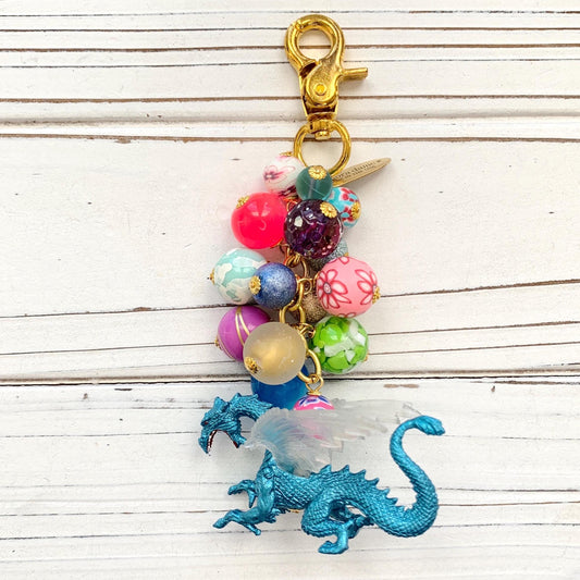 Cute dragon keychain with blue winged dragon charm. Beaded bag charm with dragon charm.