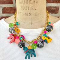 Lenora Dame Wooden Safari Animal Charm Necklace