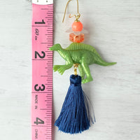 Lenora Dame Olive Spinosaurus Tassel Dinosaur Earrings