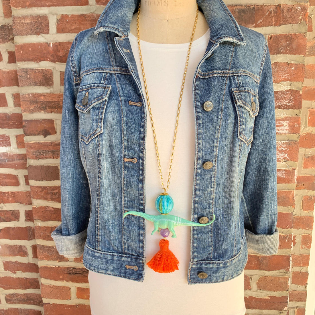 Brontosaurus pendant necklace for women. Brontosaurus charm on a long gold chain.