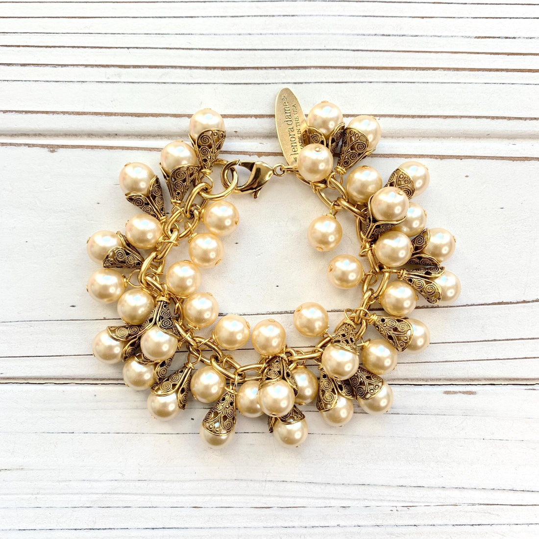 Gold charm bracelet with pearls. Pearl bridal party jewelry.