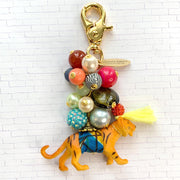 Tiger bag charm with gold trigger clasp, colorful mix of beads and embellished miniature tiger figurine. Lenora Dame bag charm.