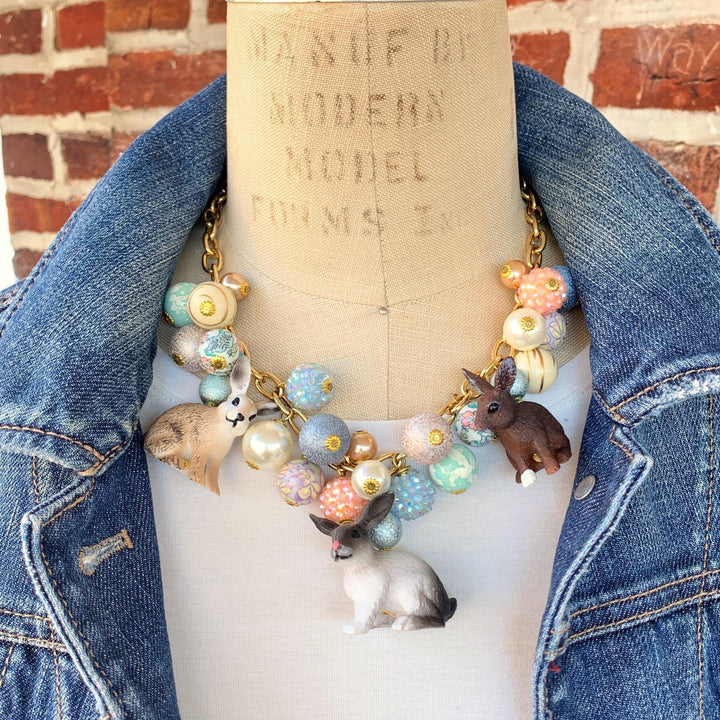 Cute necklace for spring and Easter. Bunny charms on a gold chain and pastel beads.