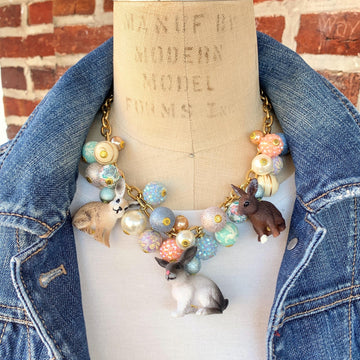 Cute necklace for spring and Easter. Bunny charms on a gold chain and pastel beads.