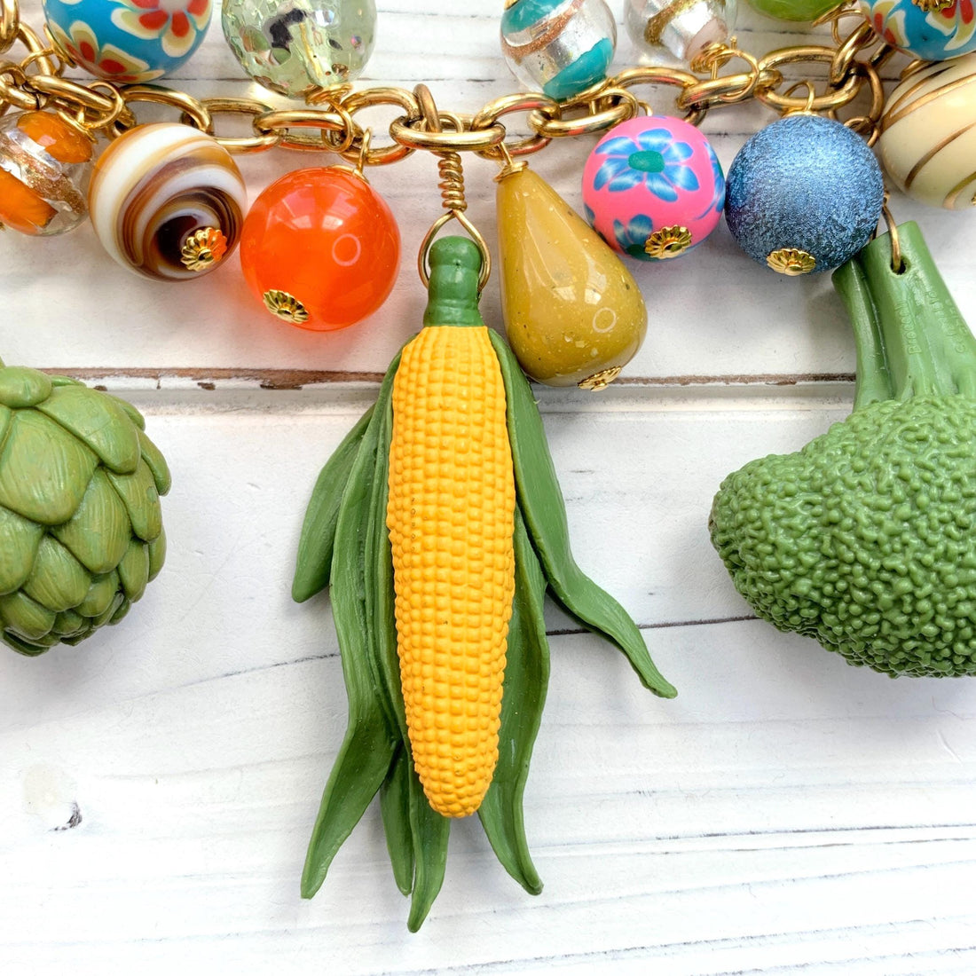 Corn charm necklace for women.