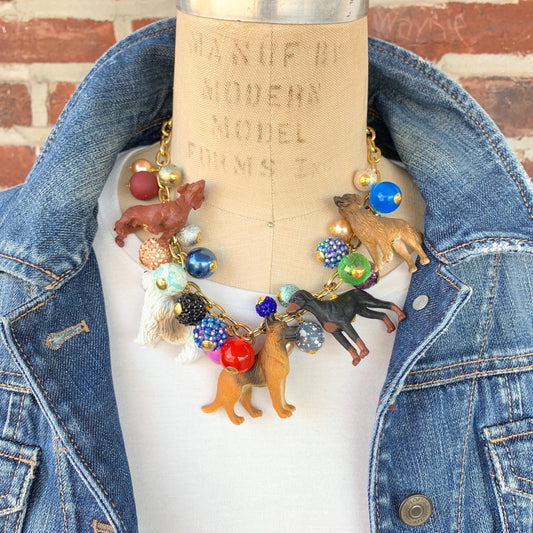 Dog charm jewelry for dog lovers. Colorful beads, dog figurine charms on a gold chain. Lenora Dame necklace. Dog necklace for humans.