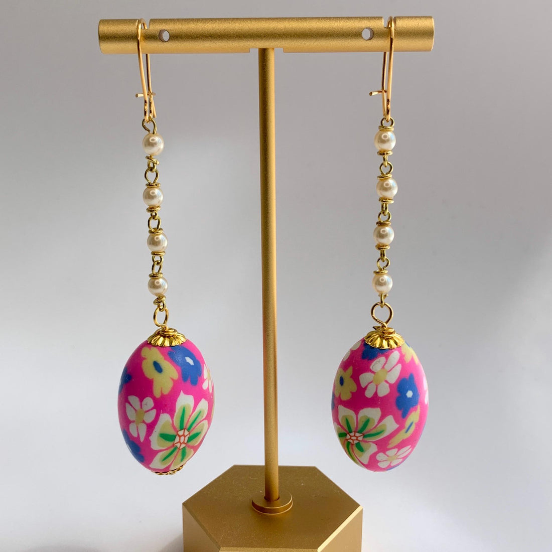 Lenora Dame Easter Egg Earrings. Cute earrings for spring. Floral egg shaped fimo beads, pearl chain dangle from French ear hooks. 