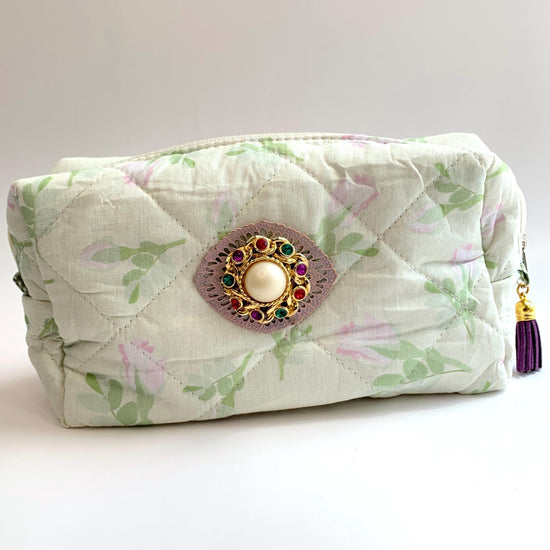 Light green with pink roses floral cotton quilted makeup bag embellished with a round pearl and rhinestone brooch. Cute makeup bags with zipper. Gifts for mom.