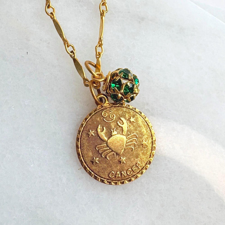 Gold zodiac pendant with a rhinestone bead charm hung on gold bar chain. Zodiac necklace for women. Cancer astrology pendant necklace.
