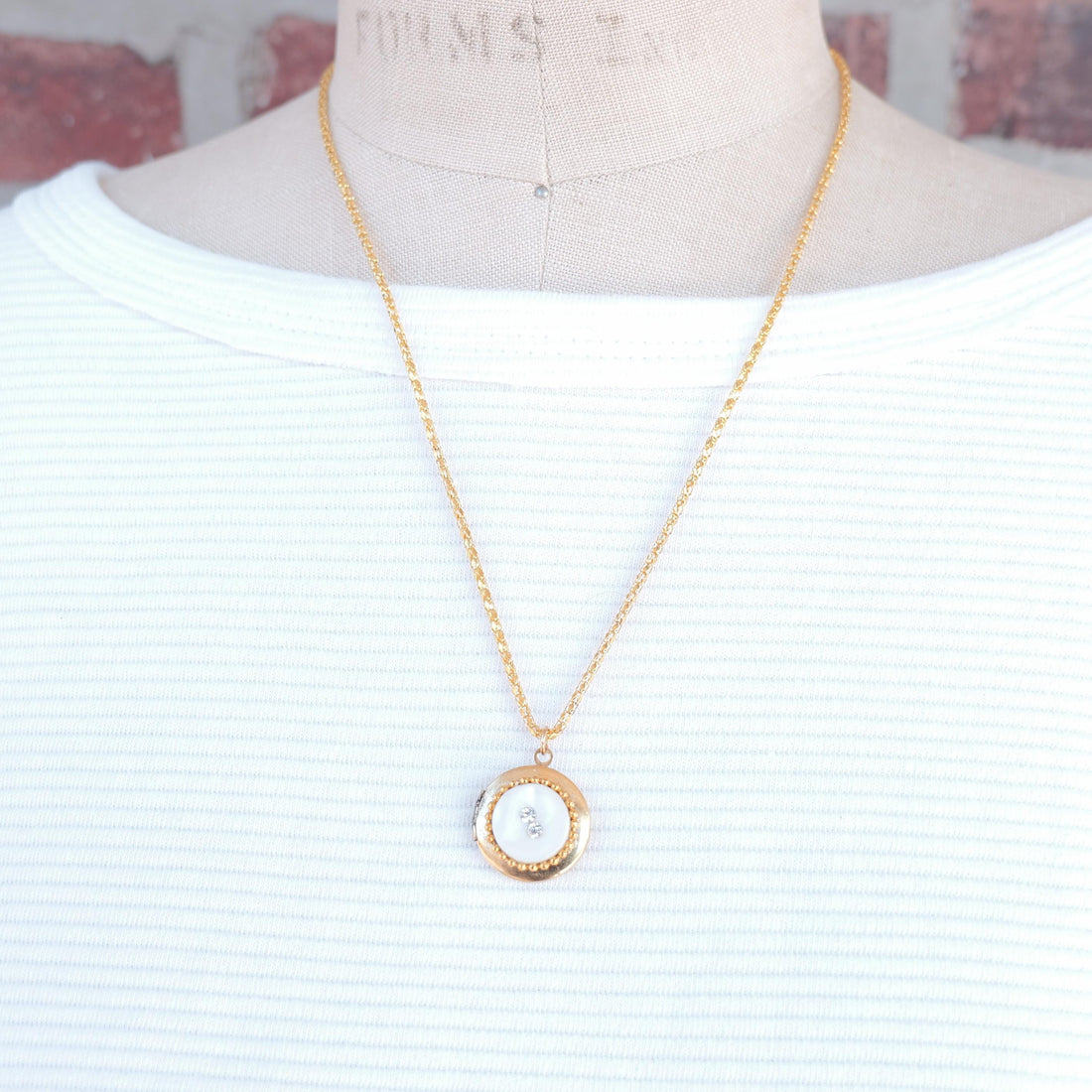 Lenora Dame White button locket necklace