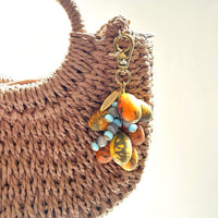 Lenora Dame Spring Egg Bag Charm - Orange & Blue