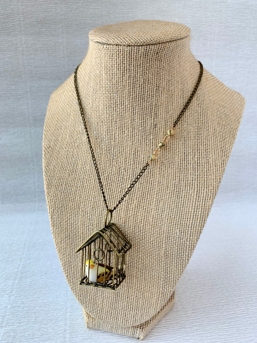 Lenora Dame A Little Bird Told Me Birdcage Pendant Necklace in Lemon