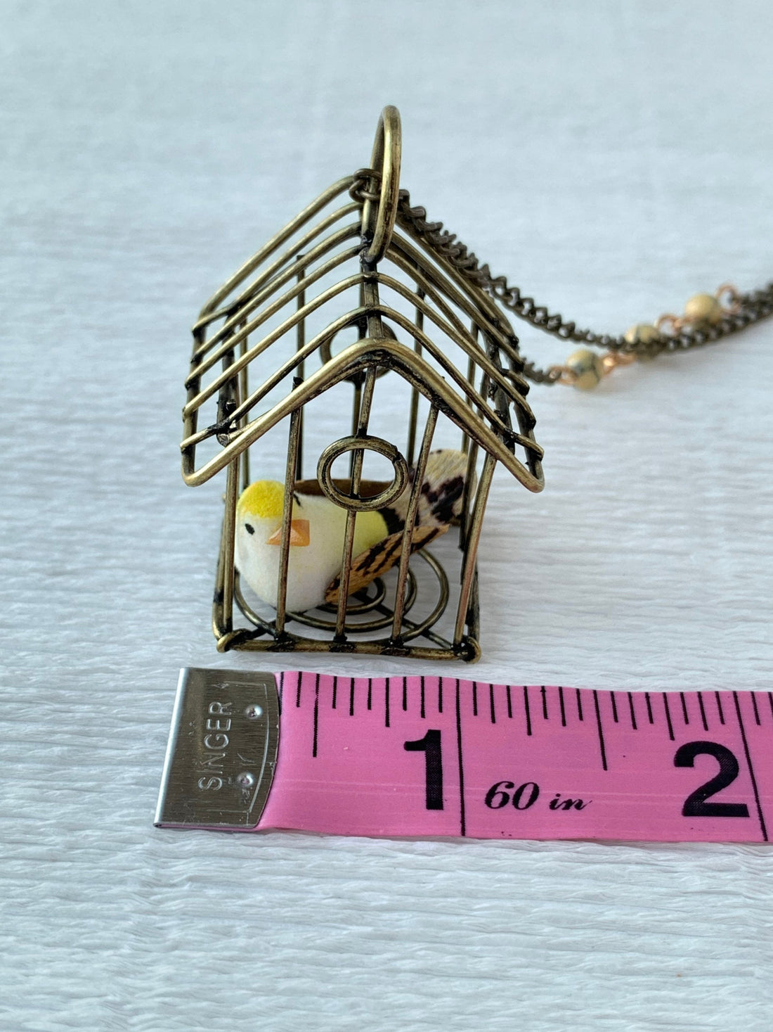 Lenora Dame A Little Bird Told Me Birdcage Pendant Necklace in Lemon