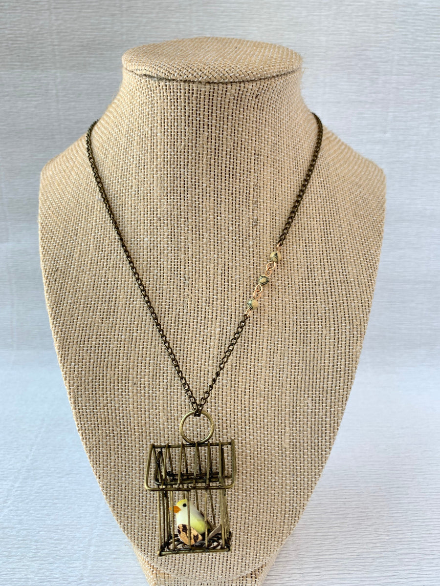 Lenora Dame A Little Bird Told Me Birdcage Pendant Necklace in Lemon