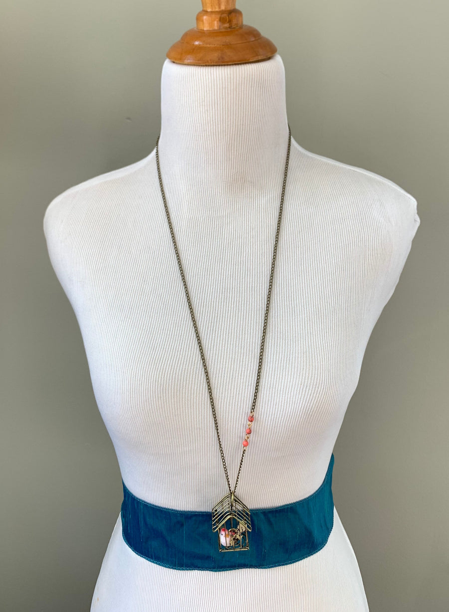 Lenora Dame A Little Bird Told Me Birdcage Pendant Necklace in Coral