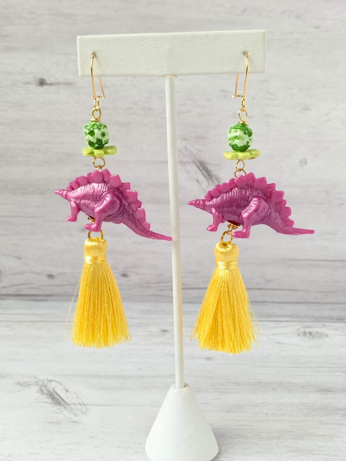 Lenora Dame Orchid Stegosaurus Tassel Earrings