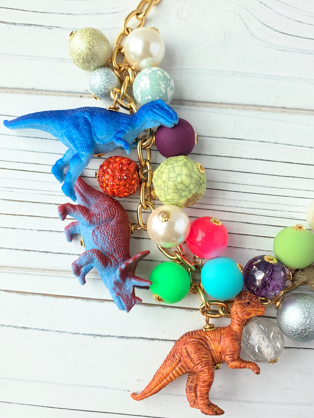 Kids dinosaur hotsell necklace