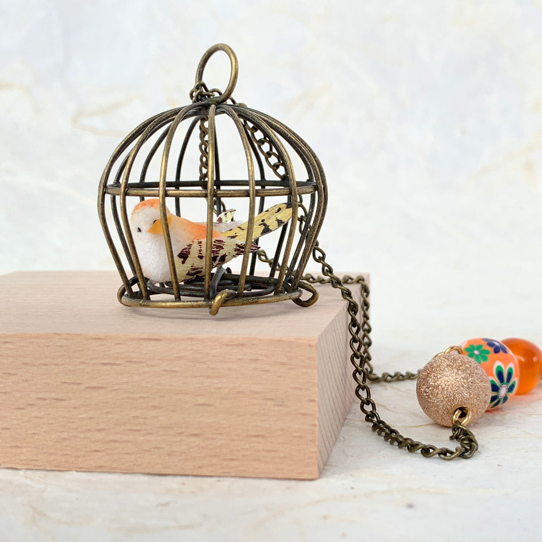 Lenora Dame Little Bird In A Vintage Birdcage Pendant Necklace in Begonia