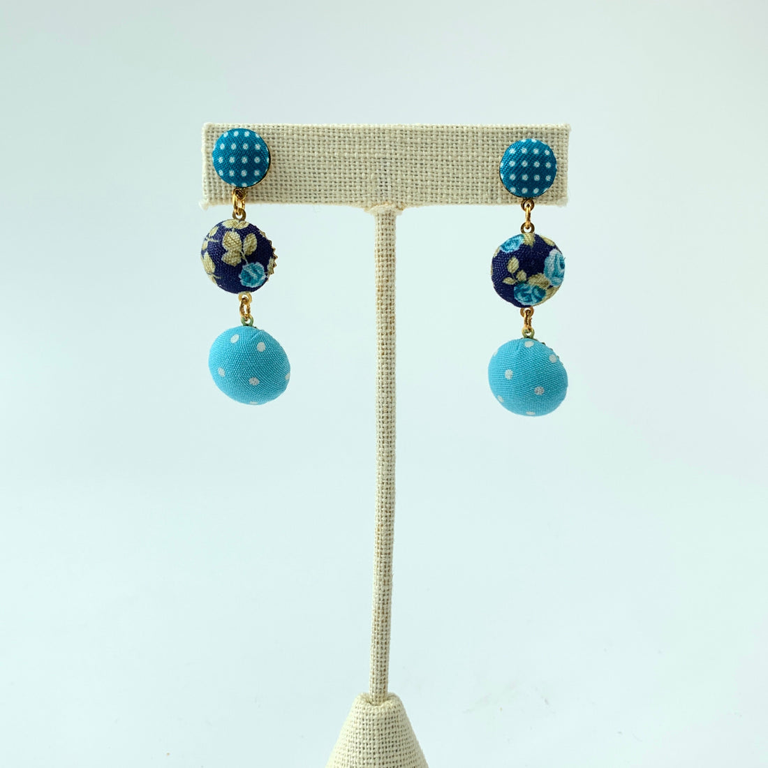 Cute as a button earrings top